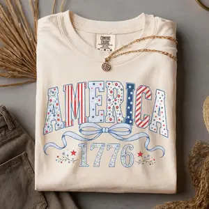 Comfort Colors America 1776 Floral Bow T-Shirt , Patriotic Stars And Stripes Collegiate Letter Graphic Tee , Feminine 4th Of July Shirt , Independence Day Outfit , American Pride Gift For Women