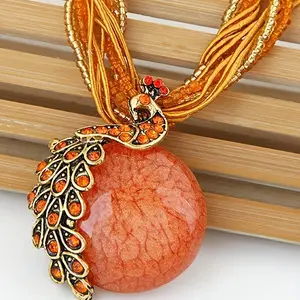 Bohemian Vintage Leaf & Peacock Pendant Necklace - Orange Red Synthetic Gemstone Jewelry with Golden-Tone Alloy Chain