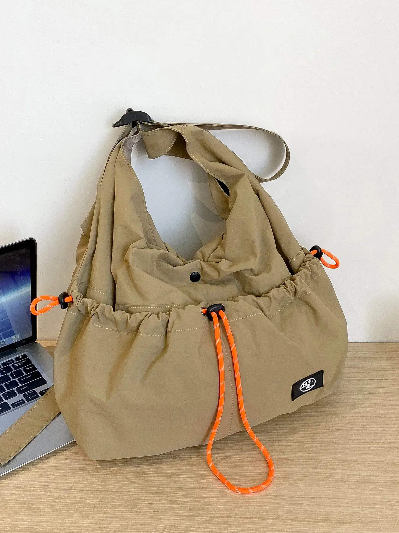 Khaki functional style drawstring shoulder bag, outdoor trendy shoulder messenger bag, Crossbody messenger bag, contrasting color casual versatile commuter multi-purpose bag, niche design suitable for daily travel, shopping, Casual Messenger Bags
