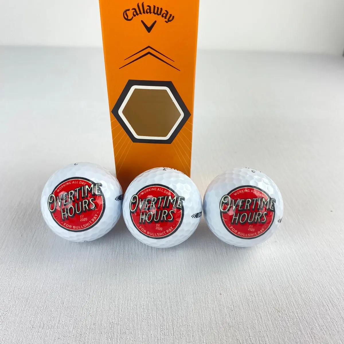 OT hours golf ball sleeve