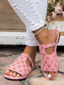 A pair of women's summer hollow-out slip-on beach sandals, comfortable for daily wear, lightweight, casual, and stylish