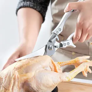 kitchen shears made of stainless steel and dishwasher-safe; ideal for cutting meat, turkey, fish, and vegetables; features non-slip handles and a safety lock, with an ergonomic handle design.
