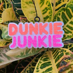 Dunkie Junkie Car Freshie Car Air Freshener with Colorful Pink and Orange Text Design