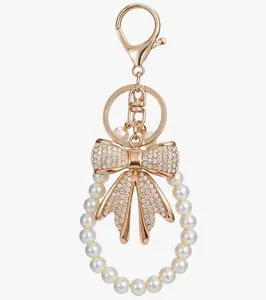 White Rhinestone Bowknot Keychain Imitation Pearl Chains Sparkly Bow Purse Charm Bag Charms for Handbags Purse Backpacks Handbag Charms Keychain Accessories for Women