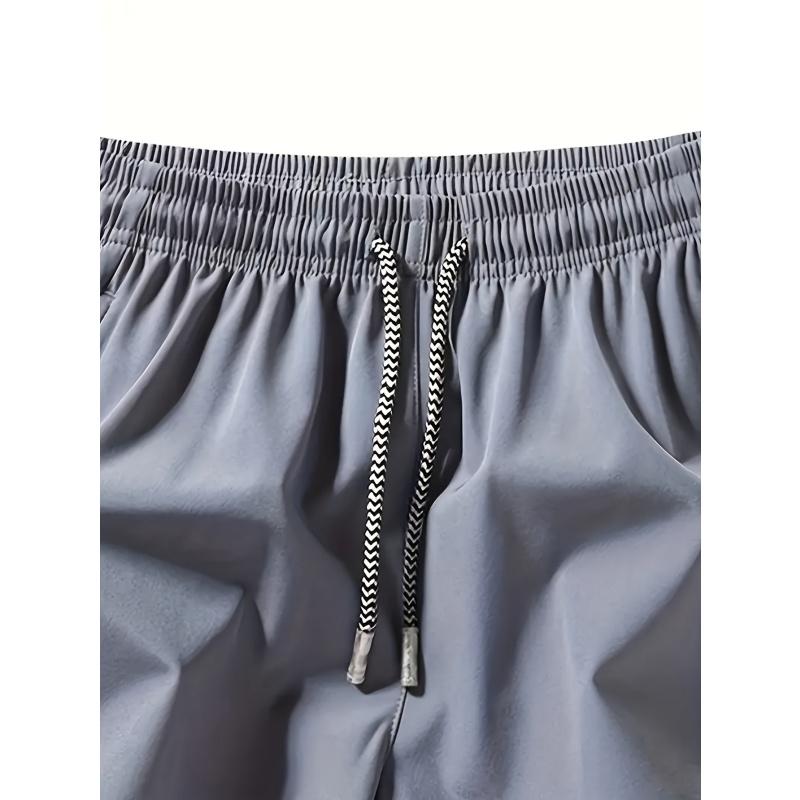 Men’s solid-color minimalist drawstring  with zippered pockets; men’s   -waist pocket shorts;  summer men’s sports bottoms; everyday wear, suitable for spring and summer. Quick-Dry Elastic Athletic Shorts Set Casual Breathable