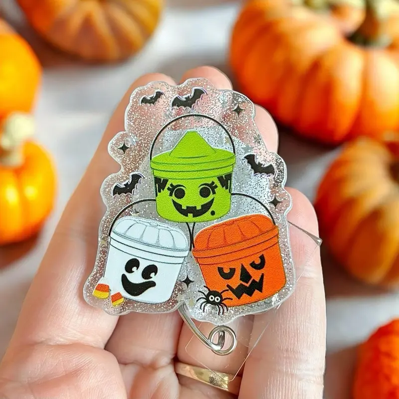 Glitter My Badge Halloween bucket nurse Spooky nurse badge reel for nurse and hospital workers. Badge clip Badge pull - Retractable swivel clip with a 360 rotation. Great gift for coworker.
