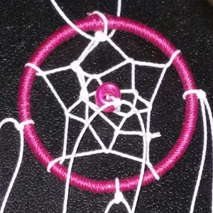 Dreamcatcher for hanging in your car with beads and feathers