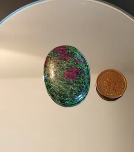 Polished 40x30mm 69.15ct Oval Ruby Zoisite Cabochon