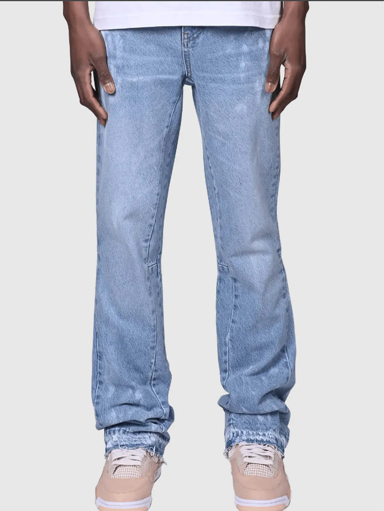 Men’s streetwear flared stacked jeans with vintage wash and distressed details