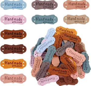 50 count Handmade Leather Labels, Microfiber Colorful Leather Labels with Love Hearts Handmade Embossed Crochet Tags with Holes for Crafts Knitting Sewing Hats Purses Clothing (10 Colors)