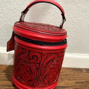 Leather jeweler with four levels