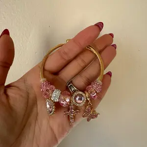 Pink cross charm bracelet