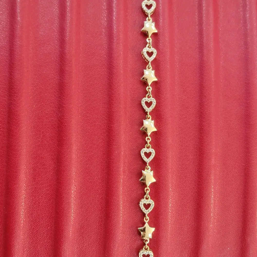 elegante pulsera d estrellas y corazones con detalles en circonia en oro real 10k zize 7.5"