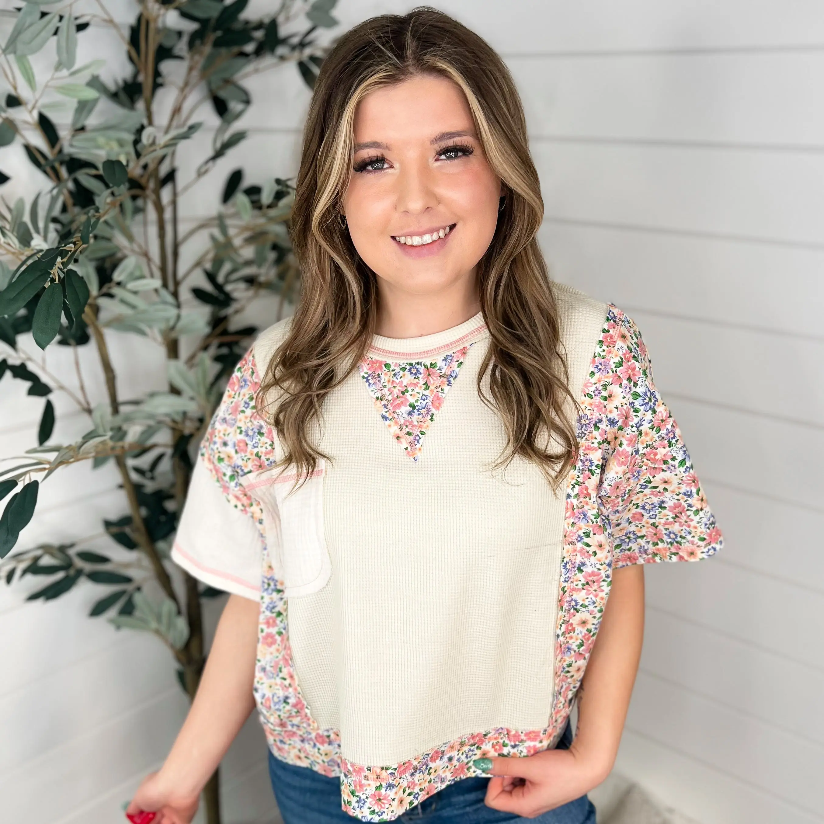 Women's Blouses in a Stretchy Thermal Knit with an Oversize Cut, Short Sleeves, and Contrasting Pink Stitching