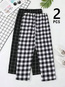 Men’s black and white checkered 2-piece loungewear pants set, loose fit, elastic waistband, soft fabric, casual style, pajama bottoms, home wear, everyday use, comfortable texture, two different plaid patterns