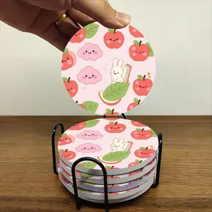 6-piece ceramic coaster set, featuring a cute and playful illustration of rabbits, apples, and clouds. These heat-resistant, non-slip coasters come with a stand and are perfect for home, dining, or as beverage mats.