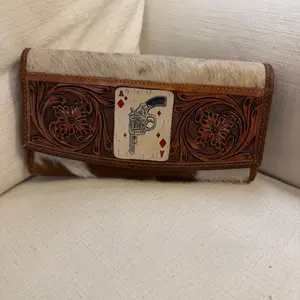 Pew Pew Wallet with Cowhide Accents and Intricate Floral Embroidery for Stylish Functionality