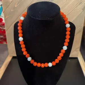 Handcrafted beaded necklace orange and white color