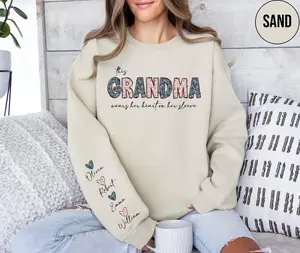 Custom This Grandma Wears Her Heart On Her Sleeve Sweatshirt, Personalized Mom With Kids Names Apparel, Motherhood Gift, Mother's Day
