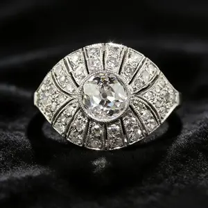 Edwardian-era vintage court-style ring, symmetrical fan-shaped ring, luxurious and layered, Art Deco style, geometric cutting technique, high-shine vintage ladies' ring, magnificent evening jewelry, collectible jewelry, engagement ring.