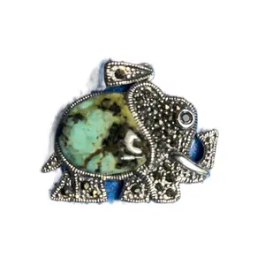 Turquoise and Silver Elephant Pendant with Unique Design and Eye-catching Color Scheme