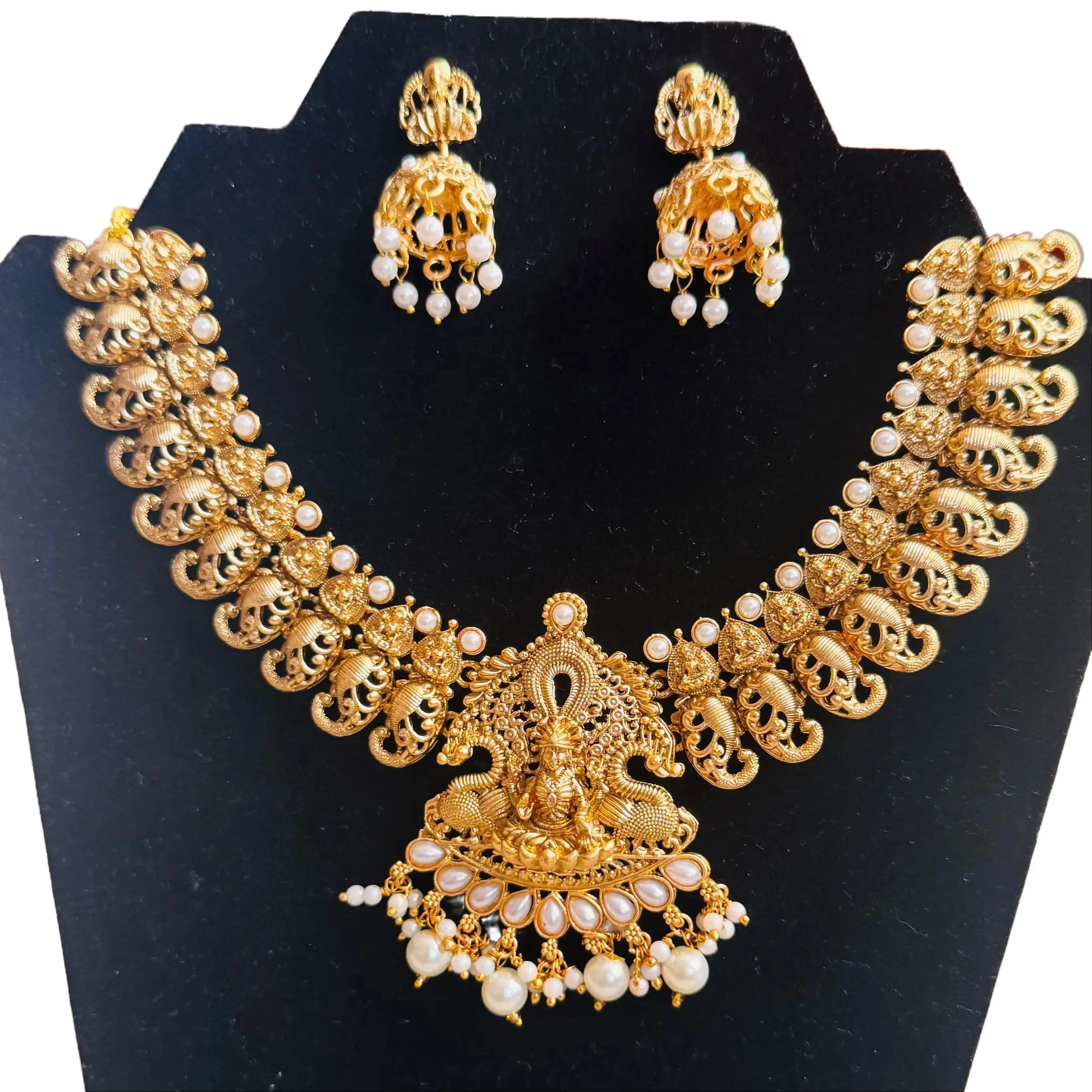 Gold and Pearl Temple set