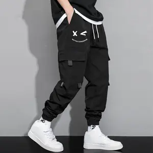 Men's cartoon face and letter print drawstring waist work pants, casual regular fit athletic pants, men's all-season trousers, men's street style casual pants, stylish dark gray Y2K clothing