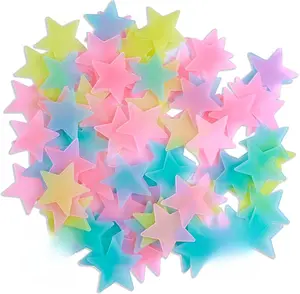 100 Pcs Colorful Glow in The Dark Luminous Stars Fluorescent Noctilucent Plastic Wall Stickers Murals Decals for Home Art Decor Ceiling Wall Decorate Kids Babys Bedroom Room Decorations Pink Blue Yellow 1.49inch x 1.49inch Easy to Use