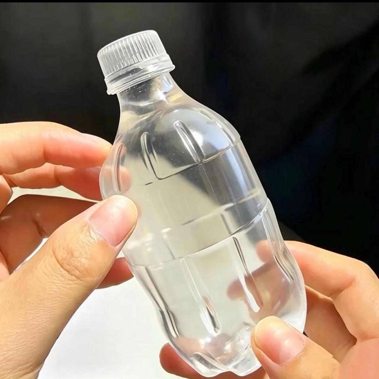 Slow Rising Squishy Water Bottle Fidget Toy - Soft Plastic Unisex Stress Relief Sensory Toy, Ideal Fidgeting Gift for Kids & Adults