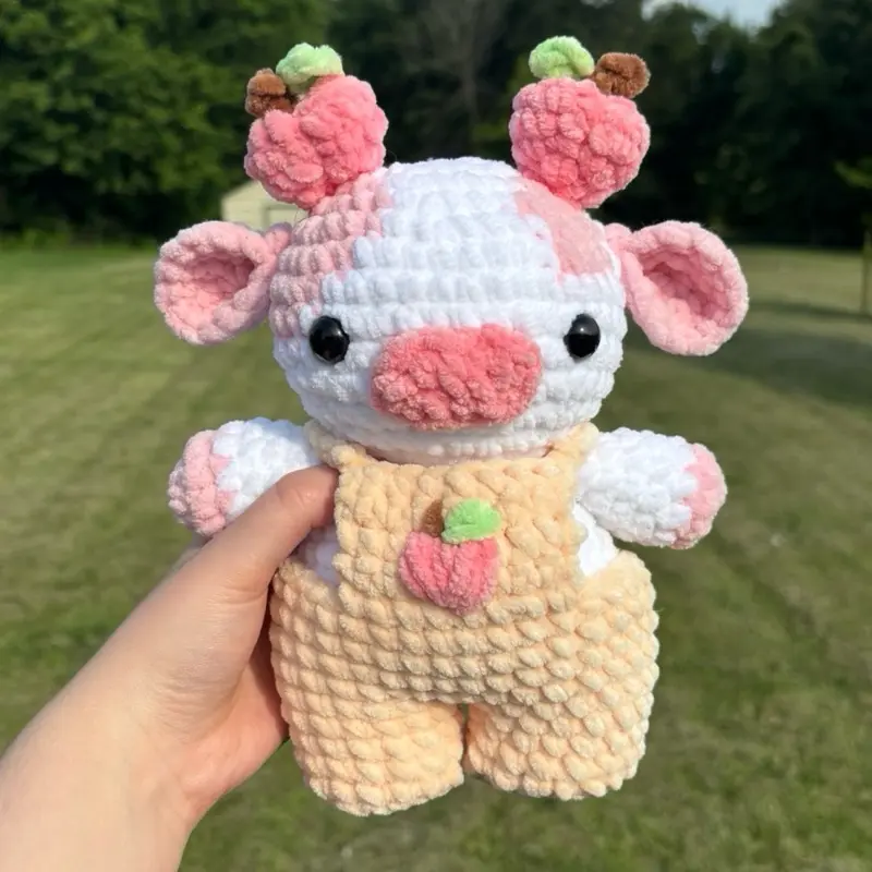 Crochet Peach Cow Handmade Soft Toy with Pink Accents and Peach Detailing
