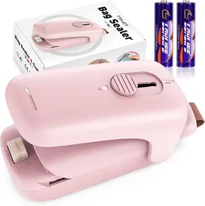 Mini Chip Bag Sealer, Handheld Heat Vacuum Sealer and Cutter, Portable Chip Bag Resealer Machine for Snack Plastic Fresh Bags Cookies - Pink - 2xAA Batteries Included