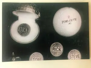 Personalized golf marker with golf gift case.