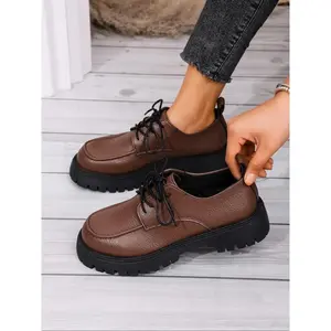 New autumn British-style thick-soled low-top lace-up women’s loafers, crafted from PU leather and PVC materials, ideal for all-day wear at home and in outdoor offices.