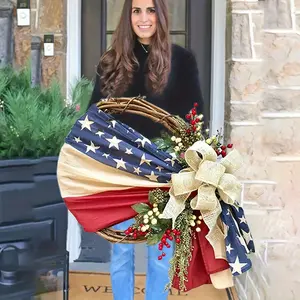 Patriotic American wreath in red and white with the American flag design, featuring a burlap bow. Suitable for front doors, offices, porches, and for Memorial Day and Labor Day decorations