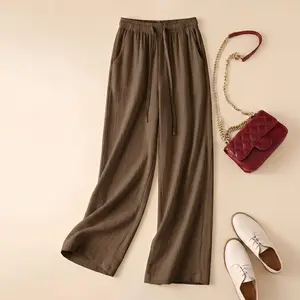 Women’s classic summer wide-leg beach pants with pockets, solid color, loose fit, breathable and comfortable casual trousers for travel and vacations