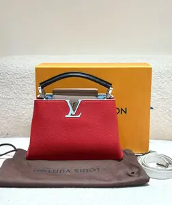 Pre-owned Louis Vuitton leather Top Handle Bags Taurillon Capucines Top Handle Bag