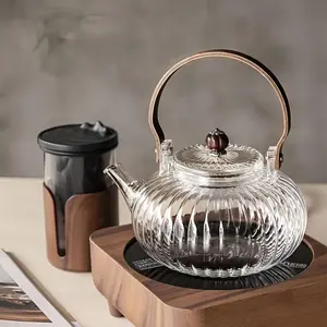 Heat-resistant Glass Teapot With Tea Filter, 1 Count Thickened Glass Tea Pot With Wooden Handle, Home Kitchen Supplies