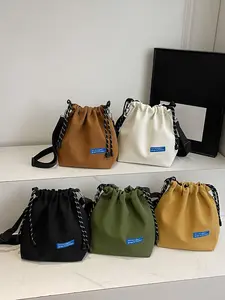 Advanced minimalist casual versatile bucket bag, drawstring drawstring design, solid color series fashionable high-quality practical texture single shoulder crossbody bag, suitable for outdoor travel, commuting to and from work