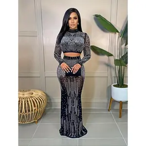 Women’s two-piece party set with rhinestones: bodycon crop top and high-waisted floor-length skirt, fabric sleeve