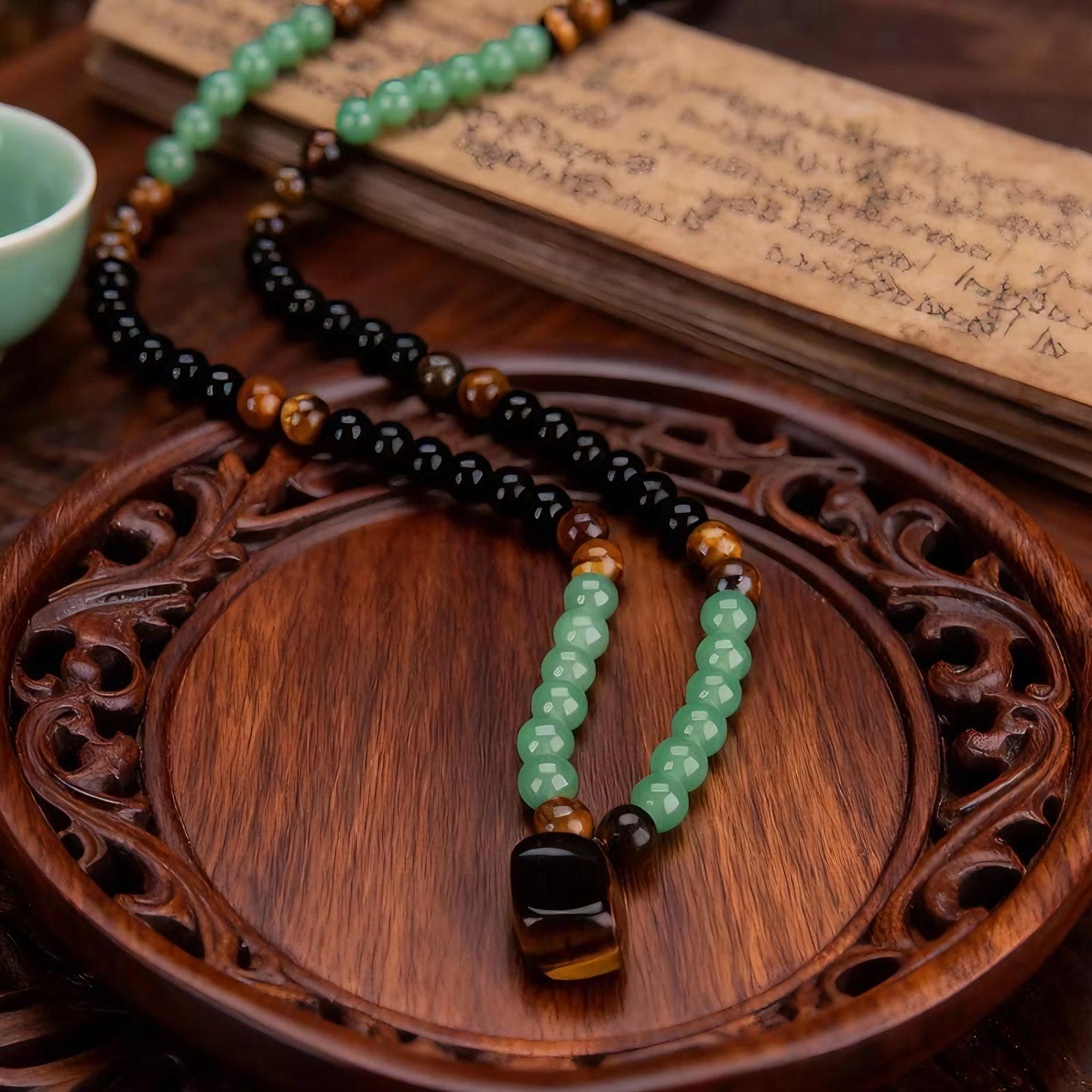 GEMRICH wealth necklace featuring a pendant set with green Dongling jade and tiger’s eye stone, infused with healing crystals; suitable for anniversary celebrations, vacations, and themed parties, and a gift that appeals to both men and women.
