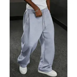 Men’s loose-fit wide sweatpants with a drawstring elastic waistband, casual baggy joggers for fall and winter, comfortable daily wear