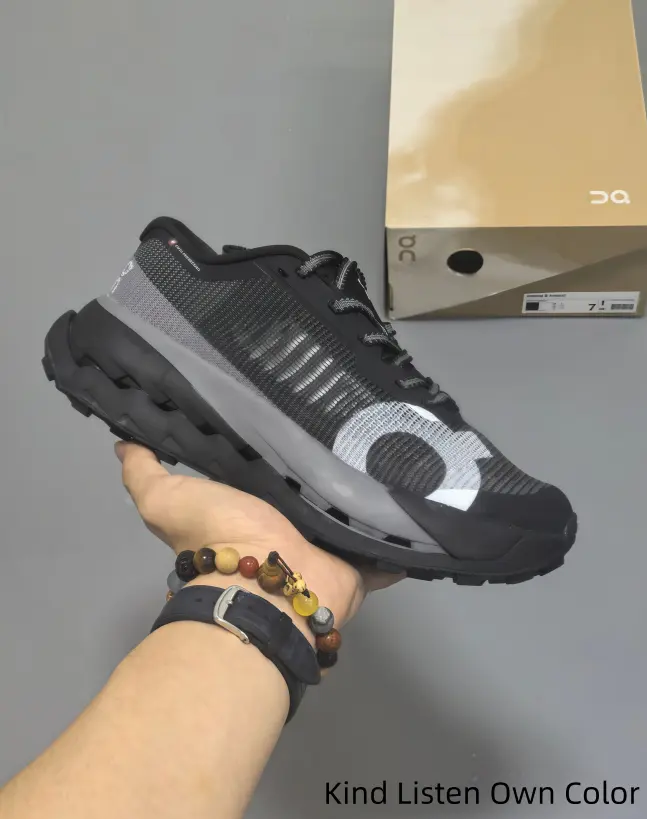 Black gray mesh hollow midsole athletic shoes deliver tough grip and full impact absorption for trail jogging, mountain walks and daily road training