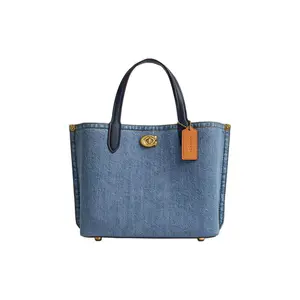 COACH Willow 24 Magnetic Snap Crossbody Handbag for Women – Denim with Brass Accents in Indigo