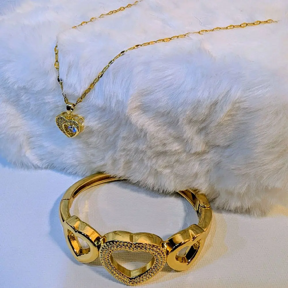Beautiful Gold Tone Two-Piece Heart Necklace and Triple Heart Bracelet Set with Elegant Design