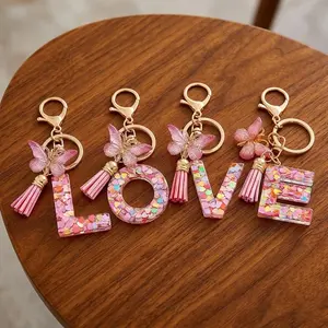 Pink Glitter Sequins Resin 26 Alphabet Letter Keychains With Butterfly Tassel Charms, Cute Decorative Accessory Pendants For Bag And Car Keys, Sweet Birthday Gift For Best Friends And Girlfriends, Lightweight Structure, Vivid Glossy Surface And Custom Per