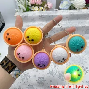 Luminous Mini Dumpling Silicone Keychain, Clicking Fidget Toy for Stress Relief. Creamy Texture, Multiple Colors, Portable Anti-Anxiety Sensory Toy. Ideal for Keys, Bags, Office & Travel
