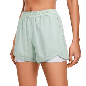 Women’s solid-color athletic shorts with pockets and drawstring waist; fitness shorts; quick-dry 2-in-1 wrap shorts; women’s running workout apparel; outdoor sports shorts; casual sports shorts