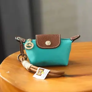 Mini Nylon Dumpling Bag Keychain Coin Purse Tiny Handbag Ornament Creative Bag Charm Portable Earphone Pouch Small Zipper Wallet Accessory Gift for Women Teens Kids Daily Travel Party