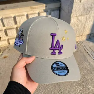 New Era Los Angeles Dodgers 9FORTY MLB Baseball Hat – Stone Curved Brim Adjustable Cap Featuring Purple LA Embroidery, Gold Star Detail And Retro Side Mascot Patch