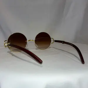 Unisex round framed  and dark brown tinted lenses. Great for fashion and stylin your outfit for the day. Round